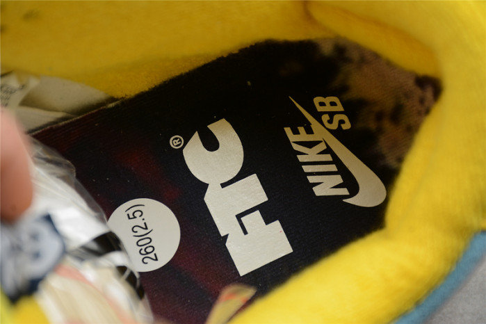 how the ftc x nike sb dunk low looks on-feet dh7687-400